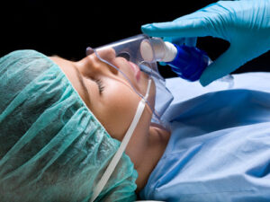General anesthesia being practiced on a sleeping patient at Dens Dental Studio in Uptown Chicago, IL
